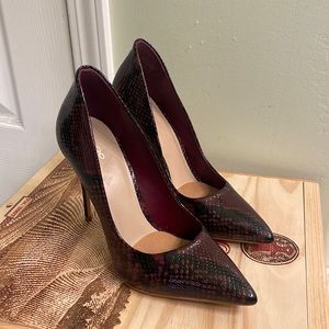 Red and black snakeskin Aldo pumps